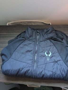 badlands Ladies White Tail Jacket Navy Blue Quilted Jacket with Teal Logo